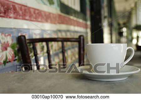 Close up of coffee cup on marble table in China Town, Singapore. View Large Photo Image Stock Image - Close up of coffee cup on marble table in China Town, Singapore.. Fotosearch