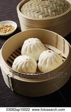 close up of dim sum in bamboo steamer View Large Photo Image Stock Image - close up of dim sum in bamboo steamer. Fotosearch