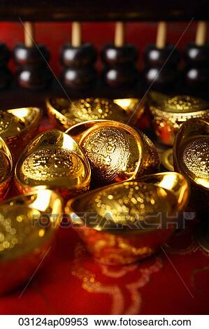 Close up of gold ingots and abacus. View Large Photo Image Stock Image - Close up of gold ingots and abacus.. Fotosearch