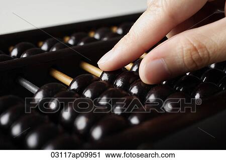 close up of hand touching abacus View Large Photo Image Stock Image - close up of hand touching abacus. Fotosearch