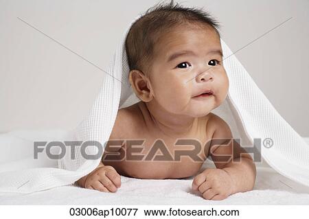 Happy Chinese baby with blanket over his head. View Large Photo Image Stock Photo - Happy Chinese baby with blanket over his head.. Fotosearch