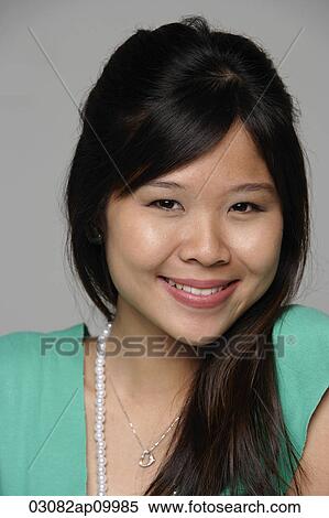 Head shot of young woman smiling. View Large Photo Image Stock Photography - Head shot of young woman smiling.. Fotosearch