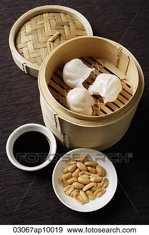 still life of dim sum with bamboo steamer View Large Photo Image Stock Photo - still life of dim sum with bamboo steamer. Fotosearch