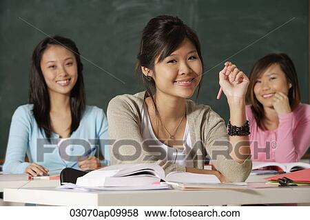 Three women in classroom. View Large Photo Image Stock Photo - Three women in classroom.. Fotosearch