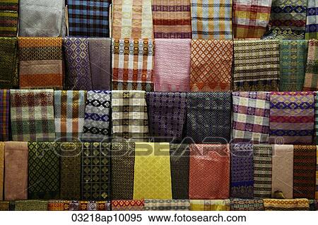 Bright colored sarongs hanging at a market View Large Photo Image Stock Photography - Bright colored sarongs hanging at a market. Fotosearch