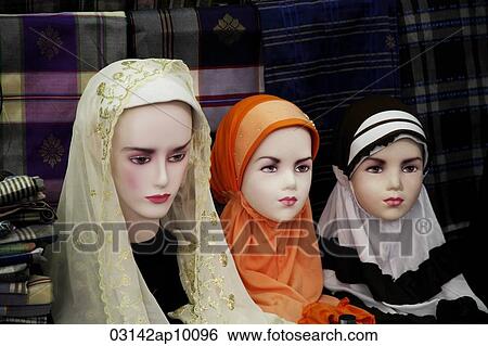 Stock Photograph - Mannequin's wearing Muslem head scarfs. Fotosearch