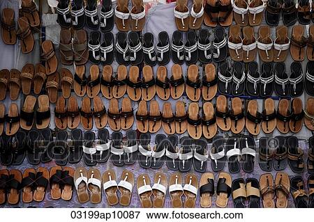 Many leather sandals on display at market. View Large Photo Image Stock Photo - Many leather sandals on display at market.. Fotosearch