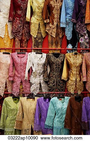 Stock Image - Traditional Malaysian attire for women, baju kebaya. Fotosearch