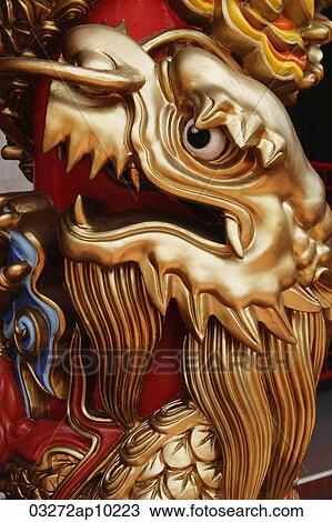 Close up of gold dragon on temple pillar View Large Photo Image Stock Image - Close up of gold dragon on temple pillar. Fotosearch