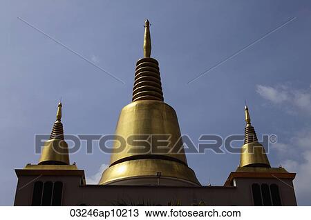 Golden spires of Buddhist Temple View Large Photo Image Stock Image - Golden spires of Buddhist Temple. Fotosearch