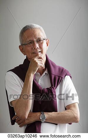 head shot of mature man with grey hair thinking View Large Photo Image Stock Photograph - head shot of mature man with grey hair thinking. Fotosearch