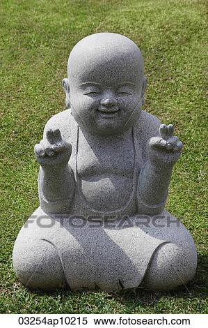 Stone statue of happy Buddha View Large Photo Image Stock Photography - Stone statue of happy Buddha. Fotosearch