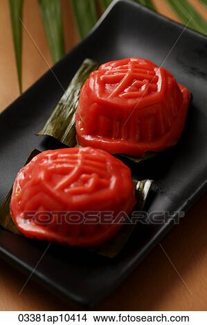Ang Ku Kueh. Chinese glutinous rice cake. With the character for "sweet". View Large Photo Image Picture - Ang Ku Kueh. Chinese glutinous rice cake. With the character for "sweet".. Fotosearch