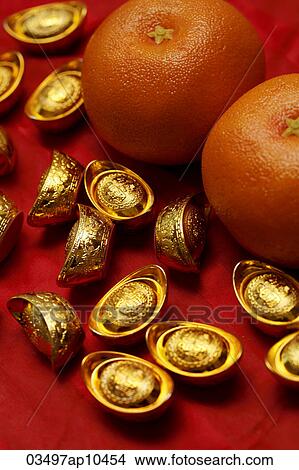 Chinese gold ingot and oranges View Large Photo Image Picture - Chinese gold ingot and oranges. Fotosearch