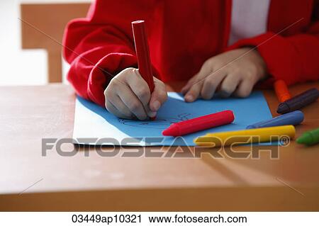 cropped shot of young girl coloring with crayons View Large Photo Image Stock Image - cropped shot of young girl coloring with crayons. Fotosearch