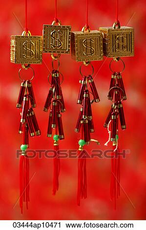 Stock Image - Gold good fortune dollar sign decoration. Fotosearch