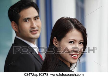 head shot of man and woman smiling View Large Photo Image Stock Photo - head shot of man and woman smiling. Fotosearch