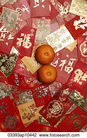 Many different red envelopes, Hong Bao scattered on table with oranges. View Large Photo Image Stock Image - Many different red envelopes, Hong Bao scattered on table with oranges.. Fotosearch