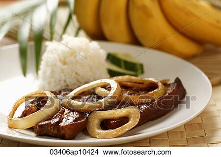 Pork steak with rice (Bistik Tagalog). Traditional Filipino dish View Large Photo Image Picture - Pork steak with rice (Bistik Tagalog). Traditional Filipino dish. Fotosearch