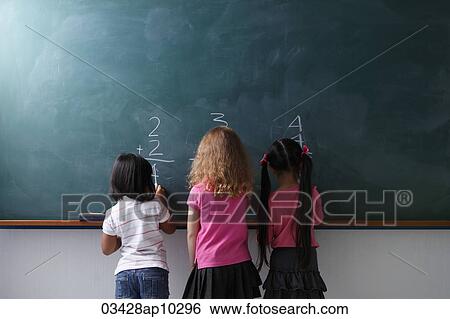 rear view of 3 young girls writing on chalk board View Large Photo Image Stock Photograph - rear view of 3 young girls writing on chalk board. Fotosearch