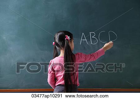 rear view of young girl writing on chalk board View Large Photo Image Stock Image - rear view of young girl writing on chalk board. Fotosearch