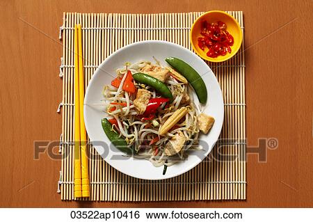 Stock Photograph - Stir fried vegetables with chillies. Chinese food. Fotosearch