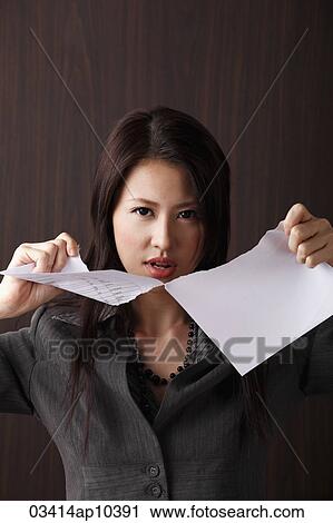 woman ripping paper View Large Photo Image Stock Image - woman ripping paper. Fotosearch