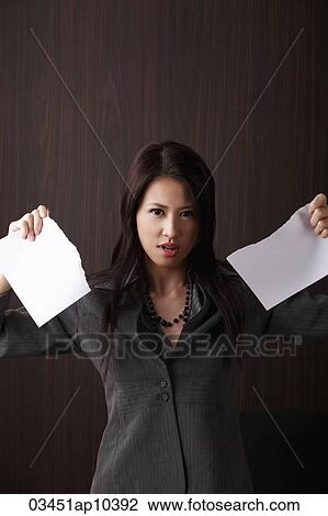 woman ripping paper View Large Photo Image Stock Image - woman ripping paper. Fotosearch