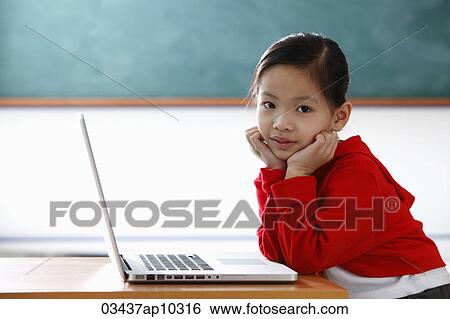 Young Chinese girl with laptop View Large Photo Image Stock Photograph - Young Chinese girl with laptop. Fotosearch