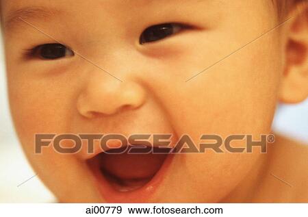 Baby boy (3 - 9 months old), laughing, close up View Large Photo Image Stock Photo - Baby boy (3 - 9 months old), laughing, close up. Fotosearch