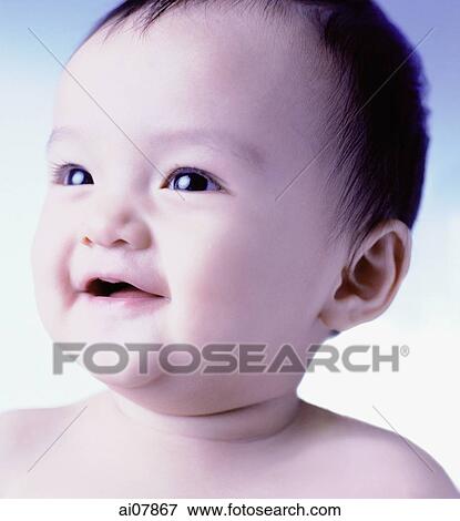 Baby girl, 6 months old, smiling. View Large Photo Image Stock Photo - Baby girl, 6 months old, smiling.. Fotosearch