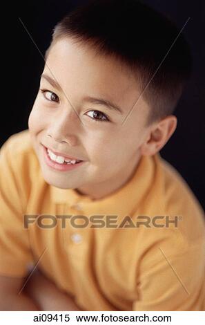 Stock Photography - Boy smiling, portrait. Fotosearch
