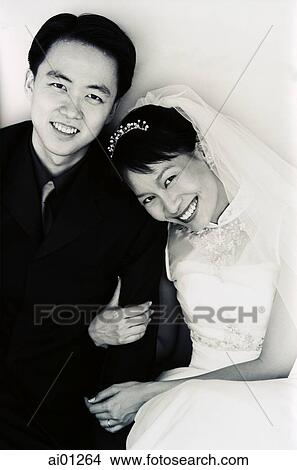 Bride and bridegroom, smiling, portrait View Large Photo Image Picture - Bride and bridegroom, smiling, portrait. Fotosearch