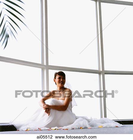 Bride sitting on floor, smiling View Large Photo Image Stock Image - Bride sitting on floor, smiling. Fotosearch