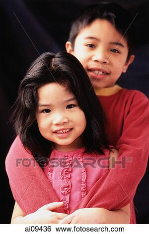 Brother and sister hugging. View Large Photo Image Stock Photograph - Brother and sister hugging.. Fotosearch
