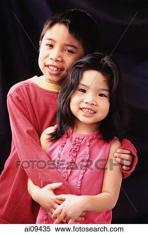 Brother and sister hugging. View Large Photo Image Stock Photography - Brother and sister hugging.. Fotosearch