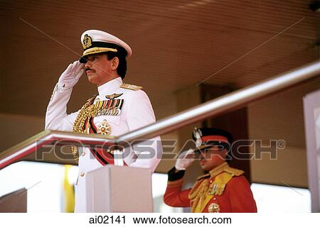 Stock Image - Brunei Darussalam, Sultan Hassanal Bolkiah on reviewing stand.. Fotosearch