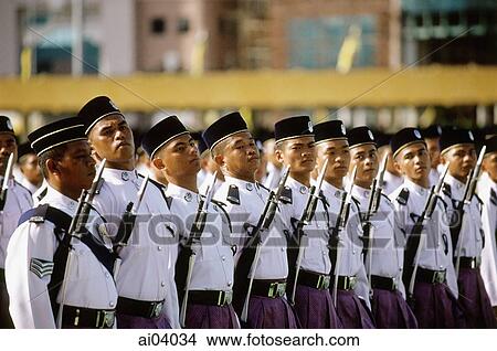 Picture - Brunei, Members of the Brunei Armed Forces on parade during a military ceremony commemorating Sultan Hassanal Bolkiah's birthday.. Fotosearch
