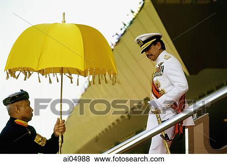 Stock Photo - Brunei, Sultan Hassanal Bolkiah descends a reviewing stand after military ceremonies marking his birthday.. Fotosearch
