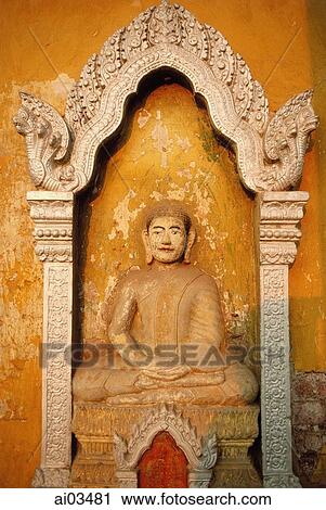 Stock Image - Cambodia, Phnom Penh, Buddha carving at Wat Sarawan. Fotosearch
