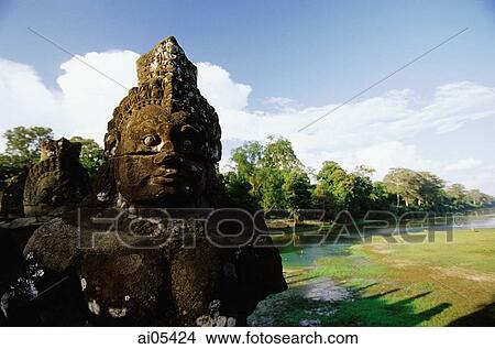Cambodia, Siem Reap, A statue in Angkor View Large Photo Image Picture - Cambodia, Siem Reap, A statue in Angkor. Fotosearch