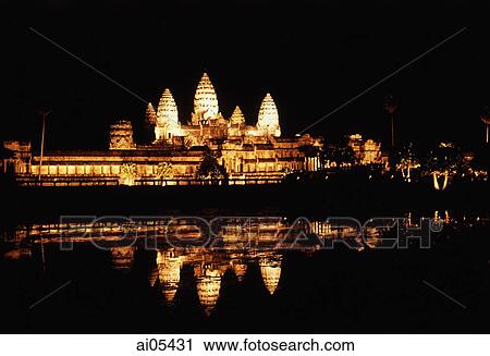 Stock Image - Cambodia, Siem Reap, Ancient Khmer temple Angkor Wat at night. Fotosearch