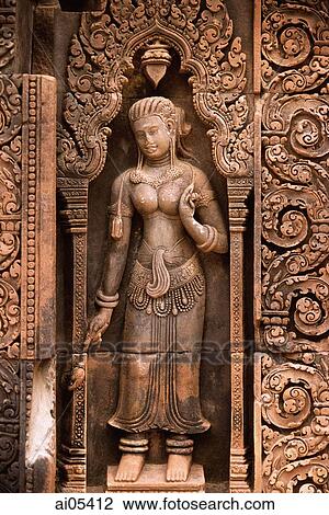Cambodia, Siem Reap, Statue of woman at Banteay Srei, the citadel of the women View Large Photo Image Stock Image - Cambodia, Siem Reap, Statue of woman at Banteay Srei, the citadel of the women. Fotosearch