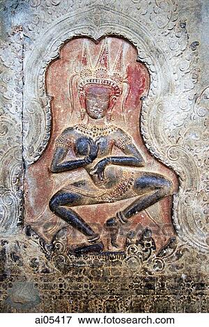 Cambodia, Siem Reap, Stone carving on wall in the Temples of Angkor View Large Photo Image Stock Photo - Cambodia, Siem Reap, Stone carving on wall in the Temples of Angkor. Fotosearch