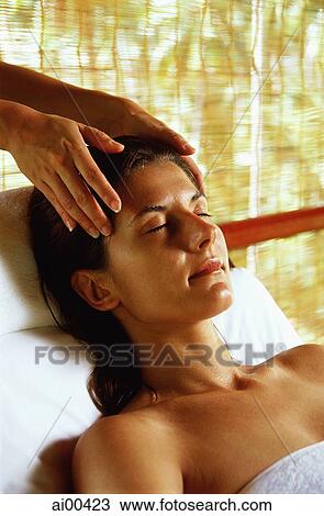 Caucasian female receiving a head massage, eyes closed View Large Photo Image Stock Image - Caucasian female receiving a head massage, eyes closed. Fotosearch