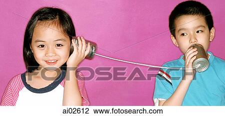 Children playing with tin can phone, purple background. View Large Photo Image Stock Image - Children playing with tin can phone, purple background.. Fotosearch