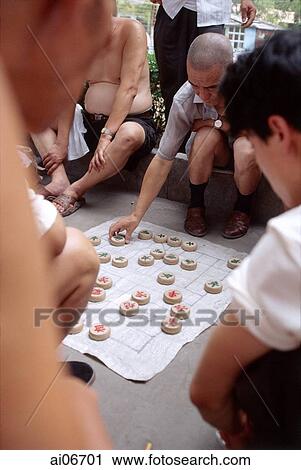 China, Beijing, Old men playing Chinese Chess View Large Photo Image Stock Image - China, Beijing, Old men playing Chinese Chess. Fotosearch