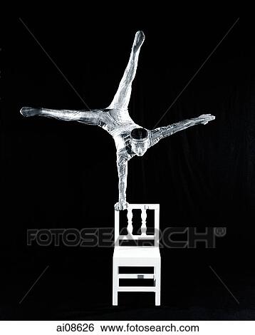 China, Hong Kong, Acrobat of the Shenyang Acrobatic Troupe balancing on chair View Large Photo Image Stock Photograph - China, Hong Kong, Acrobat of the Shenyang Acrobatic Troupe balancing on chair. Fotosearch