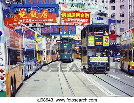 China, Hong Kong, Buses along King's Road, at Olympic Theatre, trams are passing by View Large Photo Image Stock Image - China, Hong Kong, Buses along King's Road, at Olympic Theatre, trams are passing by. Fotosearch