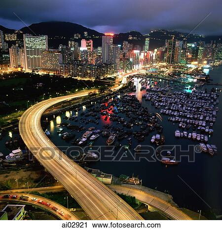 Stock Image - China, Hong Kong, Causeway Bay at dusk. Fotosearch